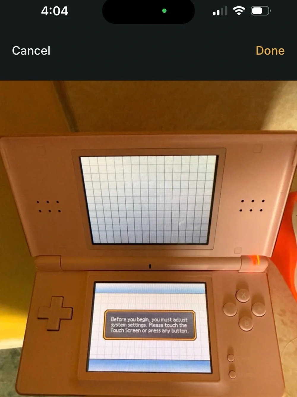 Nintendo Pink DS Lite Handheld with Five Nintendo DS Game Cases